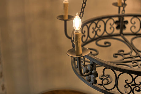 Close up shot of a Chandelier with candle-like lights