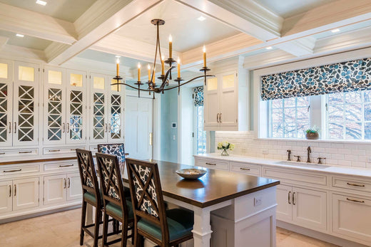 Kitchen with a Spanish style wrought iron chandelier above the island