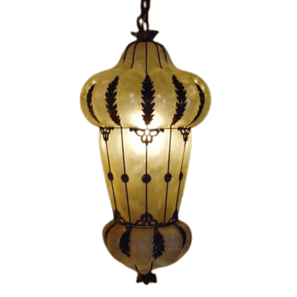 A beautifully crafted pendant light featuring a decorative metal framework with leaf motifs, enclosing a soft, glowing interior. The design combines elegance and intricate detailing, perfect for enhancing any space.