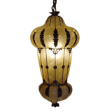 A beautifully crafted pendant light featuring a decorative metal framework with leaf motifs, enclosing a soft, glowing interior. The design combines elegance and intricate detailing, perfect for enhancing any space.