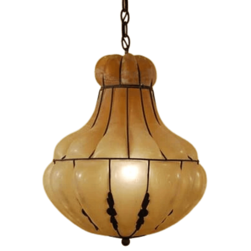 A stunning pendant light featuring an elegant, rounded shape with a warm amber hue. The design includes intricate black detailing, enhancing its classic charm. Perfect for adding a touch of sophistication to any space.