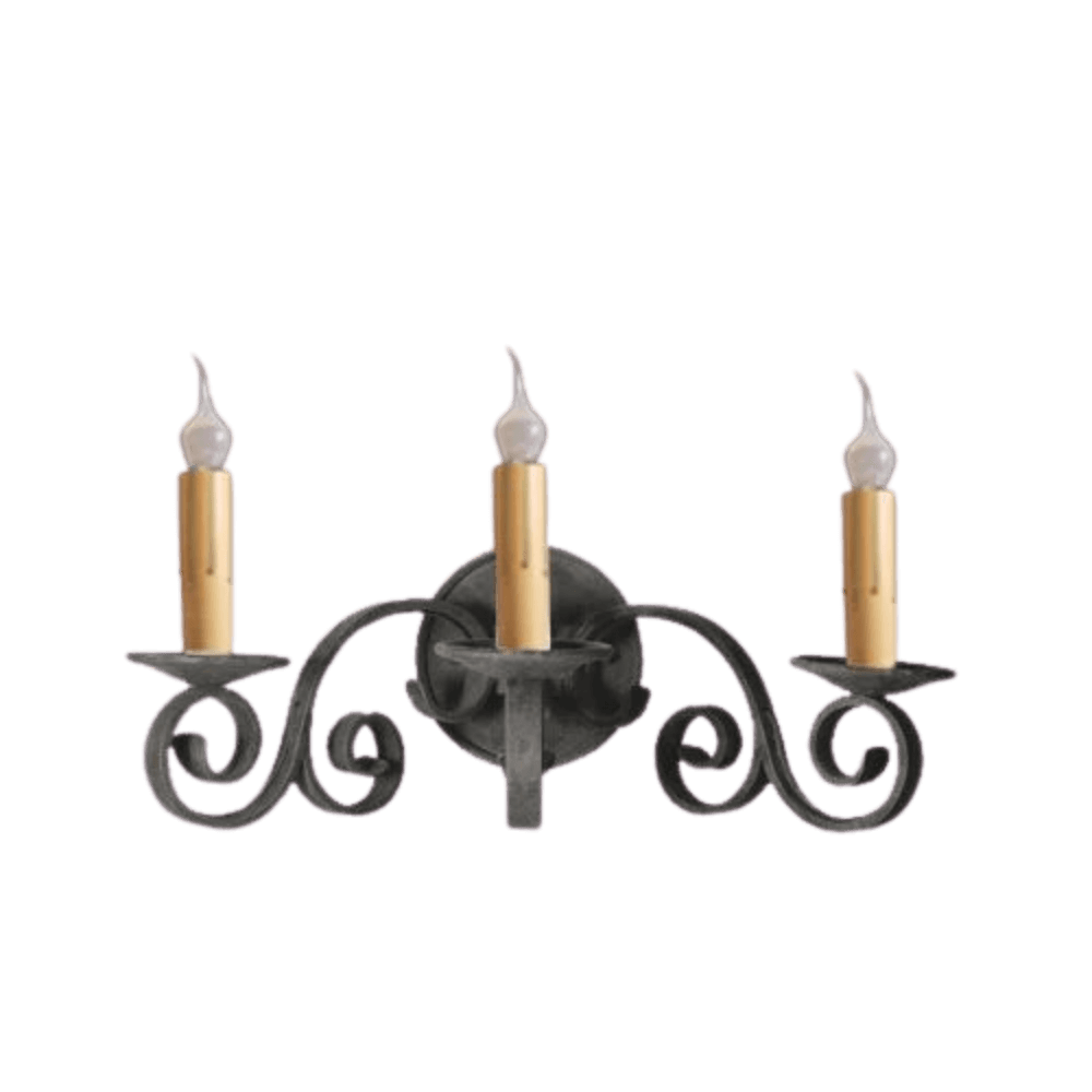 A three-arm wall sconce featuring intricate wrought iron scrollwork. Each arm holds a candle-like bulb with a warm gold base, adding an elegant touch to any space.