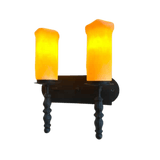 Two elegant wrought iron sconces featuring flickering amber glass shades, mounted on a dark base. The design highlights a classic aesthetic with intricate detailing.