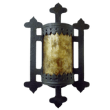 A decorative wall sconce featuring intricate wrought iron with a gold-hued, translucent glass center. The design includes ornate detailing and elegant shapes, providing a warm, inviting glow.