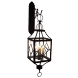 Intricately designed wrought iron wall sconce featuring a geometric glass enclosure with three candle-like lights, adding elegance and charm.