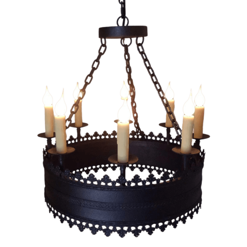 A circular wrought iron chandelier featuring six candle-like lights, each atop a slender, decorative holder. The design includes intricate detailing along the edges and is suspended by a chain, creating an elegant and rustic ambiance.