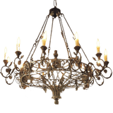 Elegant wrought iron chandelier featuring intricate scrollwork and six candle-style lights, casting a warm glow in any space.