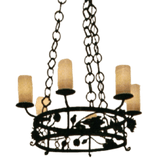 Elegantly designed chandelier featuring five ornate candle-style fixtures atop a circular wrought iron frame adorned with delicate floral motifs. Suspended by a sturdy chain, it adds a warm, inviting glow to any space.