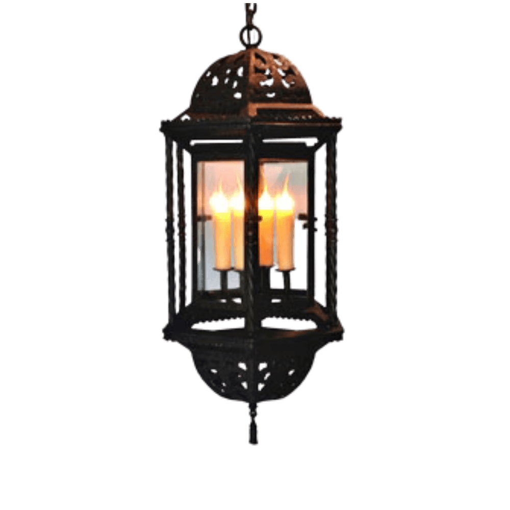 A stunning wrought iron pendant featuring an ornate design with a rounded canopy. The fixture showcases multiple glass panels that elegantly encase three glowing candles, creating a warm and inviting ambiance. The intricate details of the ironwork highlight craftsmanship and style, making it a striking addition to any space.