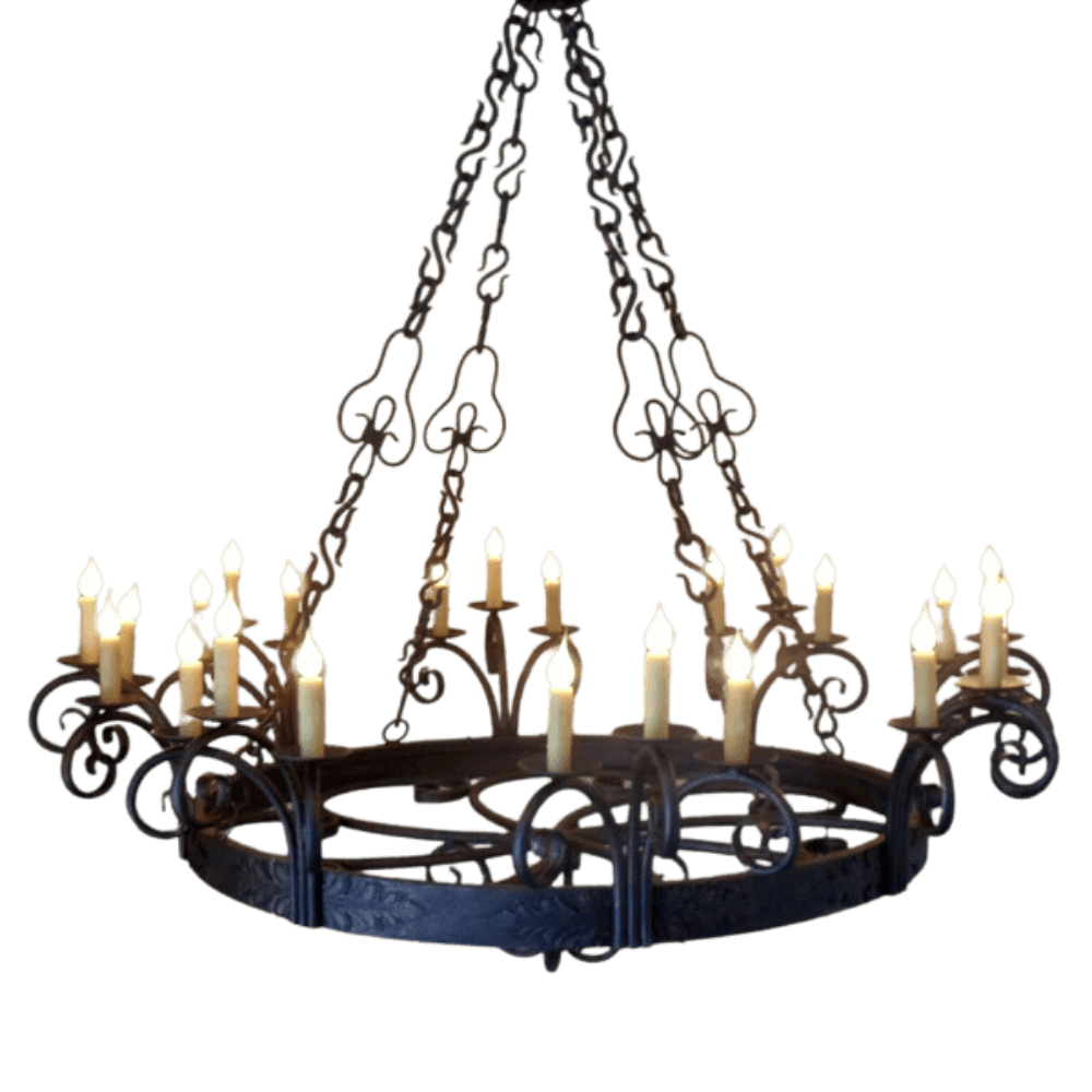 A large, ornate chandelier featuring intricate wrought iron designs and multiple candle-style lights. The fixture showcases elegant scrollwork and a rustic finish, suspended by detailed chains, perfect for adding charm to any space.