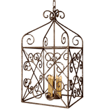 Elegant wrought iron pendant featuring intricate scrollwork and a lantern shape, showcasing three candle holders inside, exuding timeless charm.