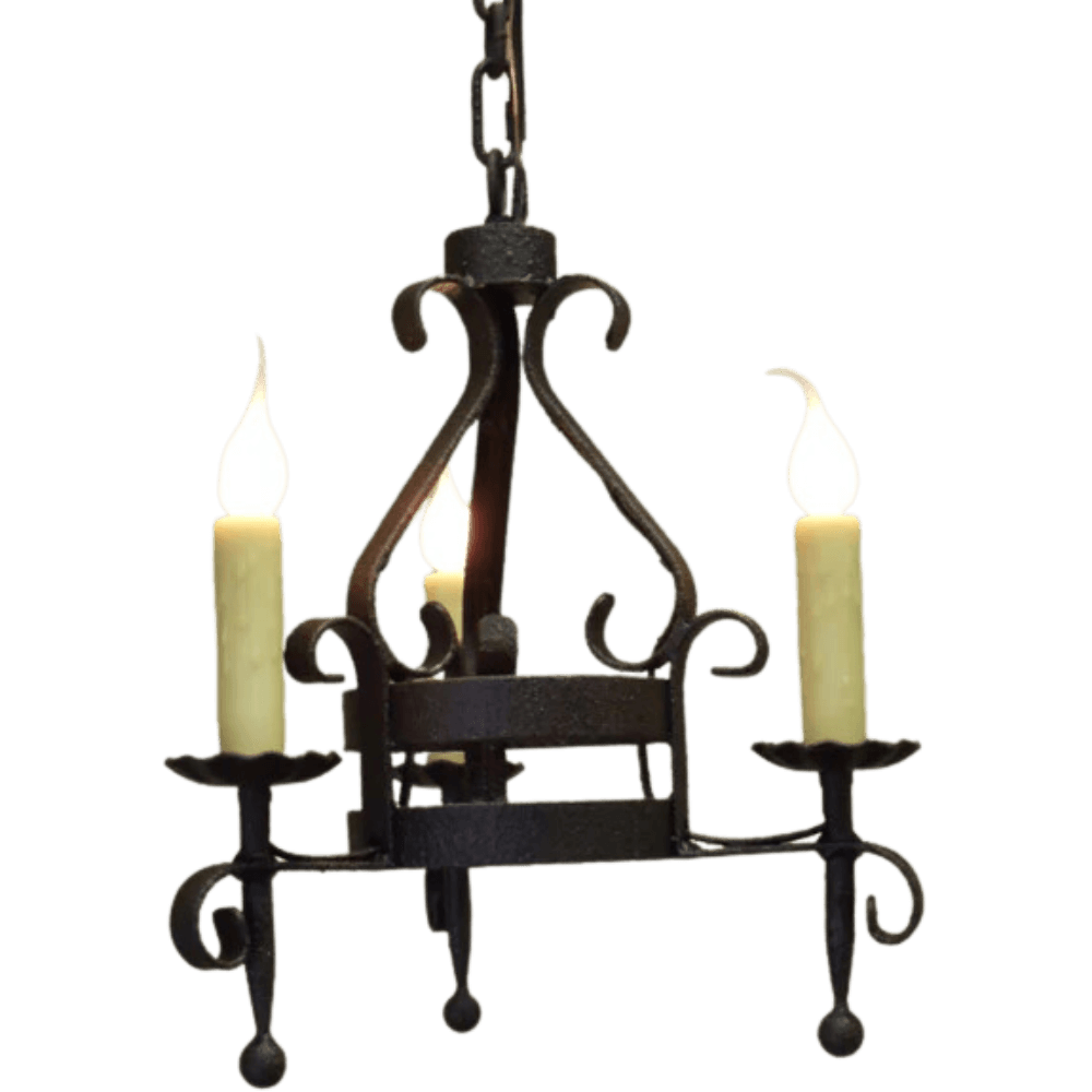 A decorative wrought iron chandelier featuring three candle-like bulbs, intricate scrollwork, and a robust, antique finish. Ideal for adding rustic elegance to any space.