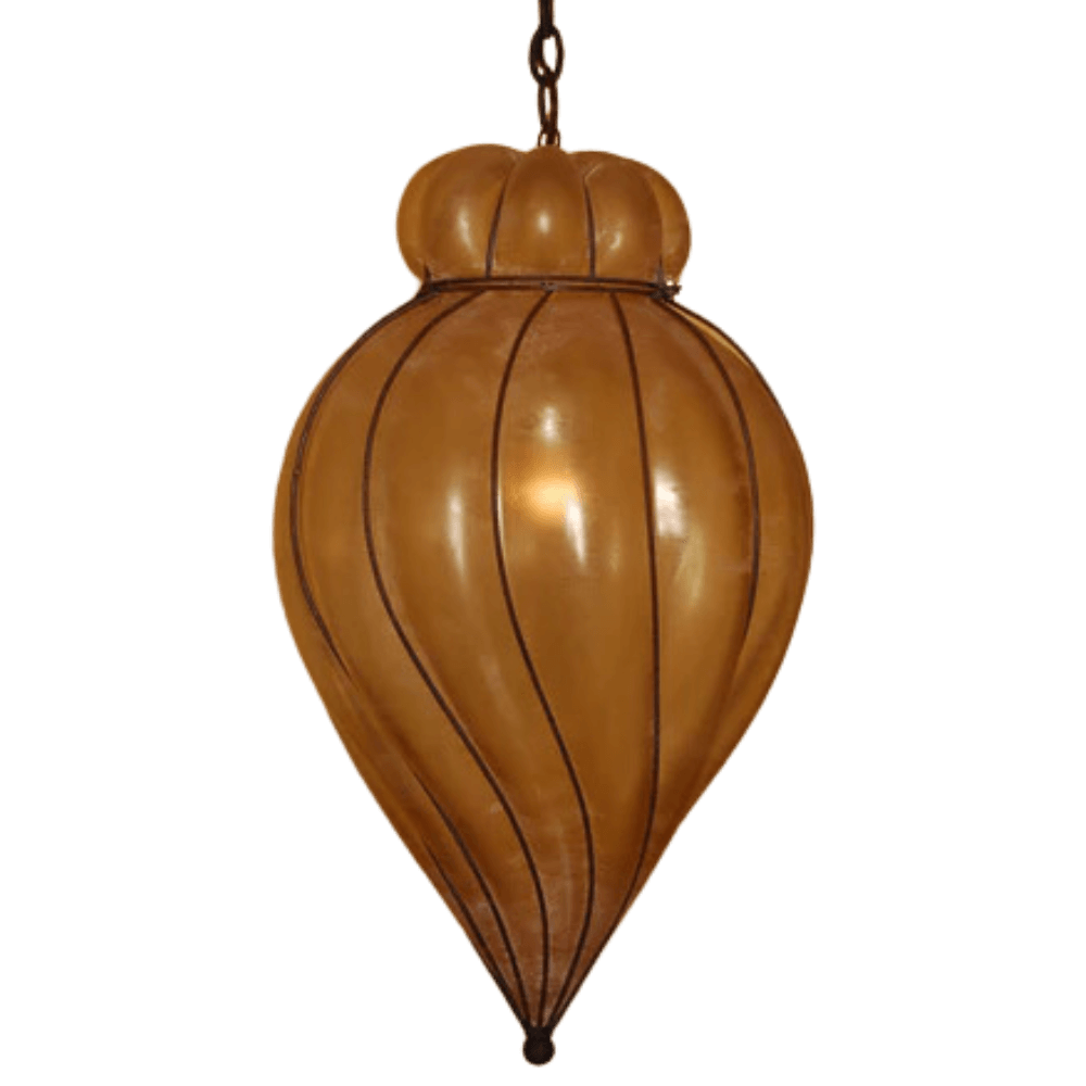 Elegant pendant light featuring a rounded, elongated design with fluted detailing. Finished in warm tones, it showcases wrought iron craftsmanship.