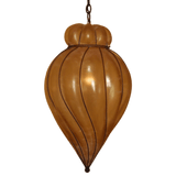 Elegant pendant light featuring a rounded, elongated design with fluted detailing. Finished in warm tones, it showcases wrought iron craftsmanship.