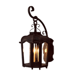 A decorative wrought iron sconce featuring a classic design with elegant curves and a lantern-style structure. It holds multiple candle-like lights, casting a warm glow. The intricate details enhance its charm, making it a stylish addition to any space.