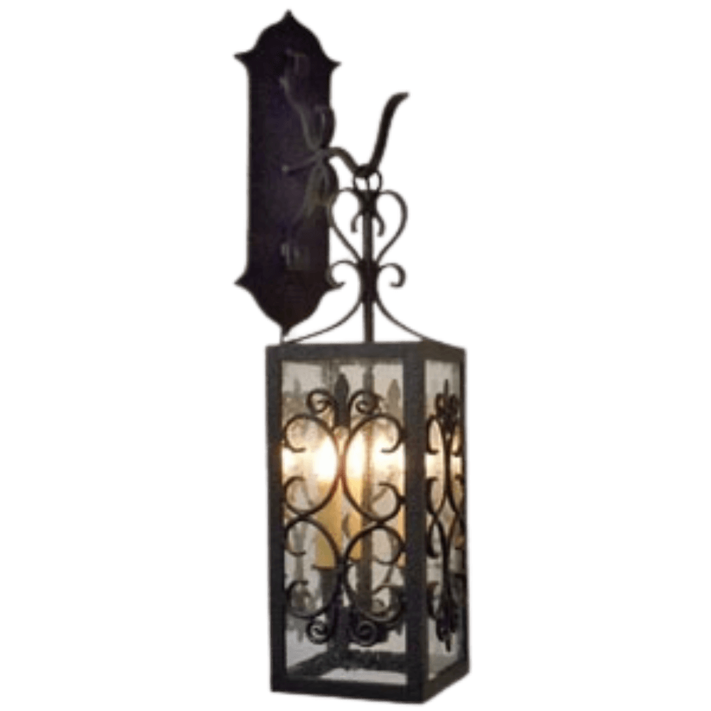 Wrought iron wall sconce featuring intricate scrollwork and a rectangular shape. It has a classic black finish and glass panels, showcasing four light bulbs.