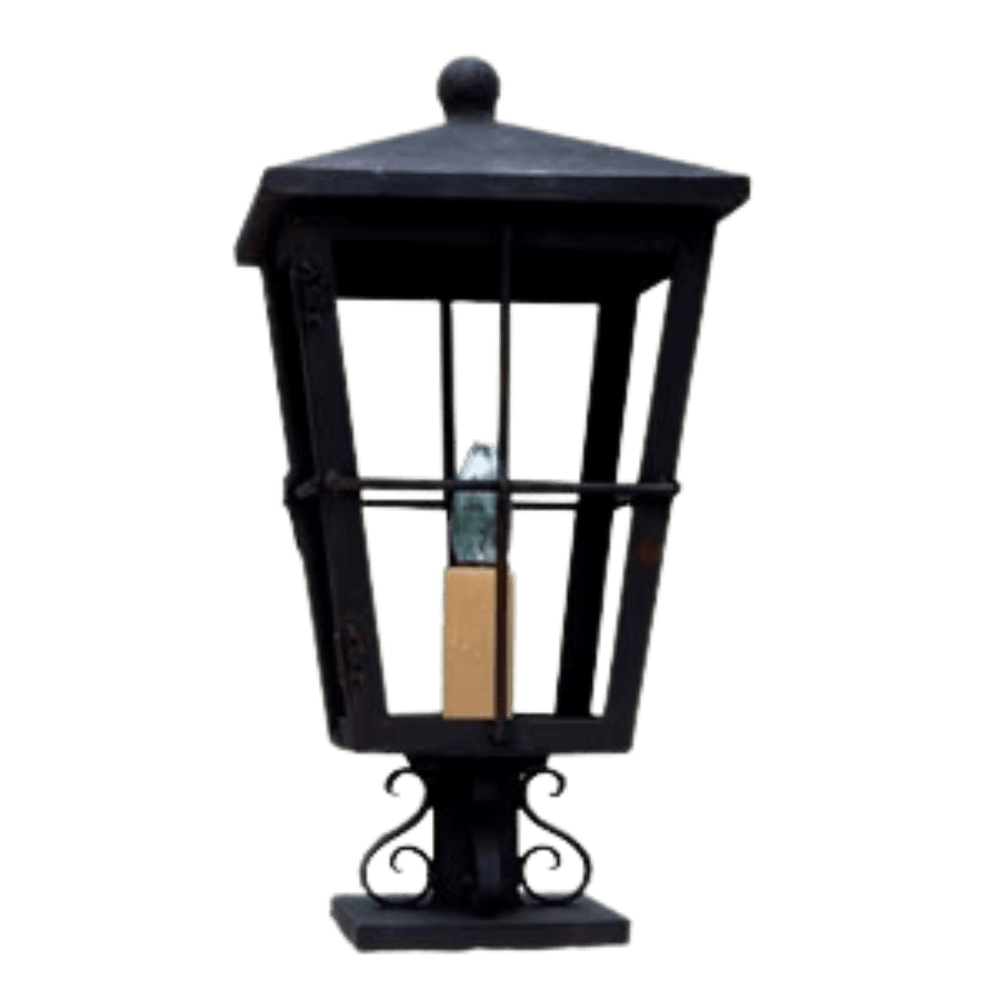 A decorative wrought iron sconce featuring a square shape with a pointed top, enclosing a candle-like light source. Intricate scrollwork base adds elegance to its sturdy design.