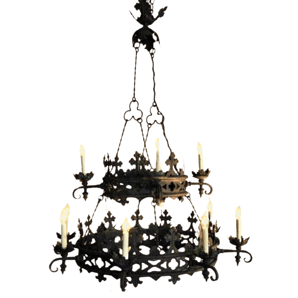 A beautifully designed wrought iron chandelier featuring intricate scrollwork and floral accents. It holds multiple candle-style lights, creating an elegant and warm ambiance. Ideal for adding a touch of sophistication to any space.