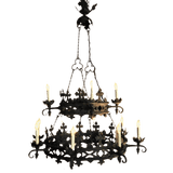 A beautifully designed wrought iron chandelier featuring intricate scrollwork and floral accents. It holds multiple candle-style lights, creating an elegant and warm ambiance. Ideal for adding a touch of sophistication to any space.