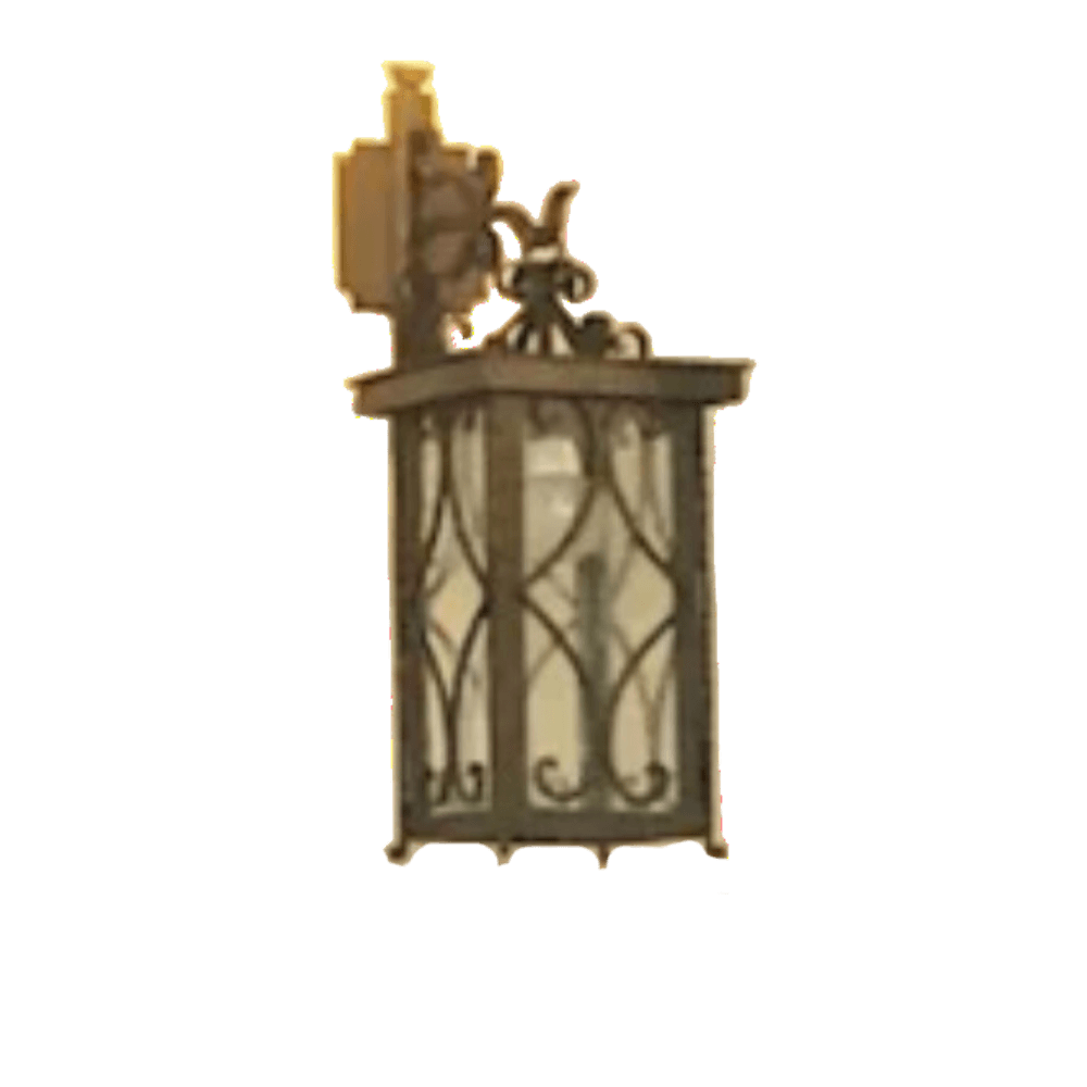 A decorative wall sconce featuring an intricate wrought iron design. The fixture has elegant curves and a frosted glass insert, providing warm illumination. Its classic style adds a touch of sophistication to any space.