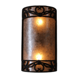 A decorative wall sconce featuring a textured amber glass shade surrounded by intricate wrought iron detailing. Two warm lights illuminate the fixture, creating a cozy ambiance.