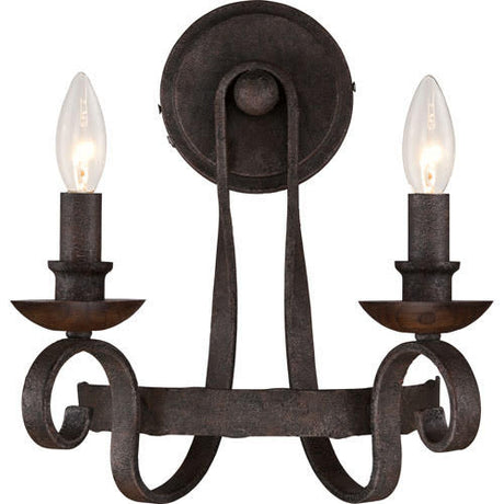 A two-light wall sconce featuring intricate wrought iron detailing, with elegant curves and a dark finish. Each light is topped with a clear, teardrop-shaped bulb, adding a warm glow to any space.