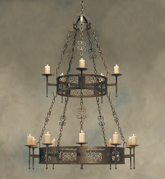 A beautifully crafted wrought iron chandelier featuring intricate scrollwork and multiple candle holders, elegantly suspended from a chain.