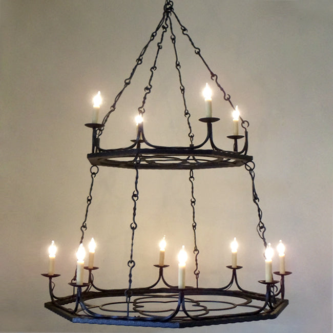 A two-tier chandelier featuring intricate wrought iron design with ten candle-style lights. The elegant curves and chains enhance its rustic charm, creating a warm ambiance ideal for dining or living spaces.