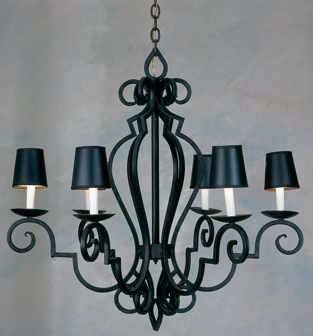 Elegant wrought iron chandelier featuring intricate curves and scrollwork, complemented by black shades over candle-like lights, perfect for enhancing any space.