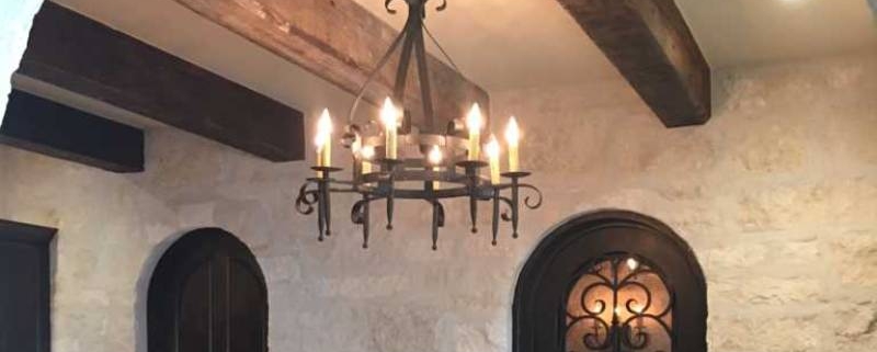 Spanish Mission Style chandelier hung from the ceiling.